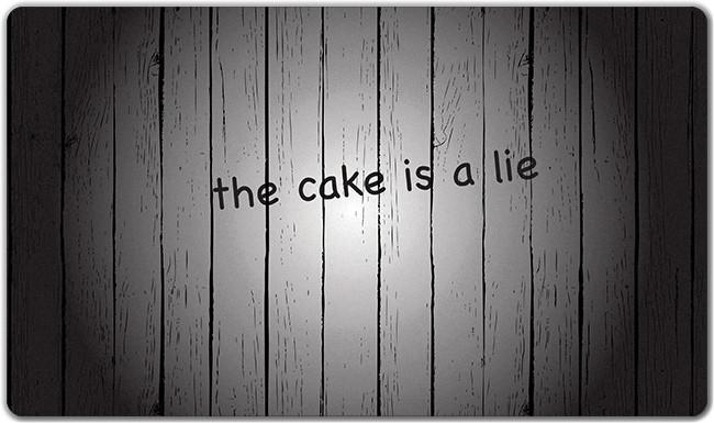 The Cake is a Lie Playmat - Premium Playmat from Inked Gaming - Just $34.99! Shop now at Game Crave Tournament Store